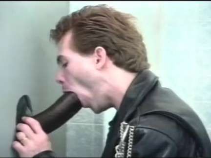 Gay glory hole cock sucking on the toilet